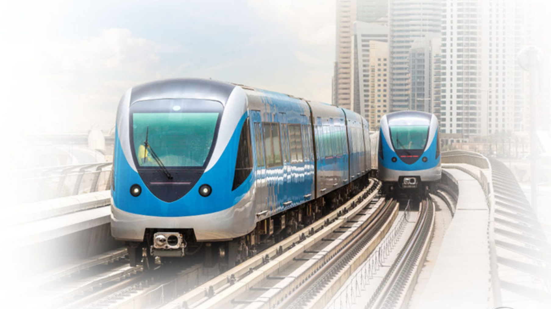 people holding umbrellas on a busy street at night lit by street lights and illuminated signs in Tokyo, Japan